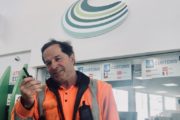 Man in orange hi viz at Channel Ports with two way radio